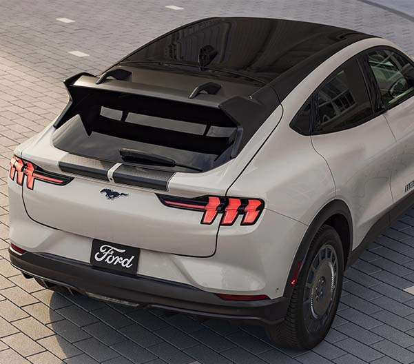 The rear view of a white 2025 Ford Mustang Mach-E.