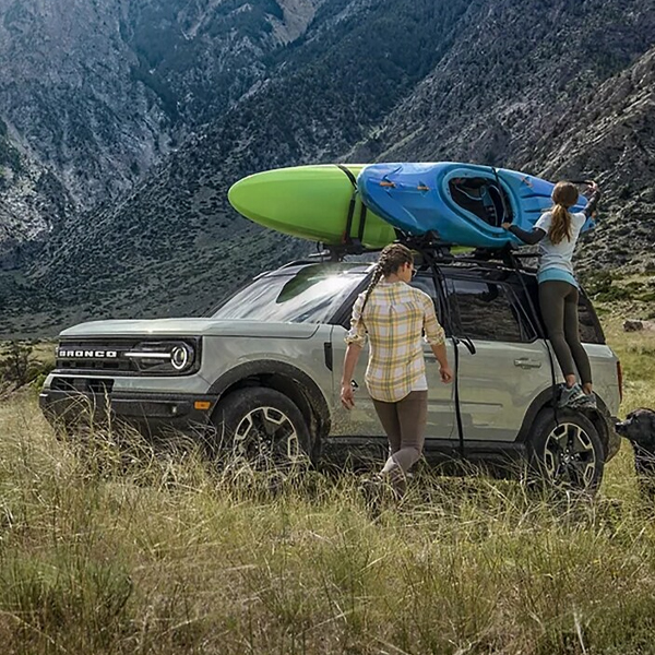 2024 Ford Bronco Sport parked in grass by mountains