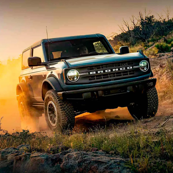 2024 Ford Bronco driving on dirt road