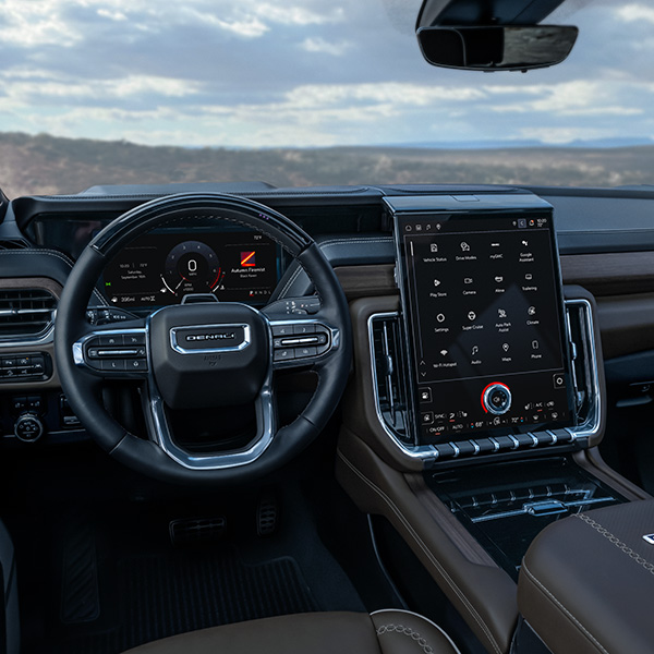 Interior dashboard shot of the 2025 GMC Yukon.