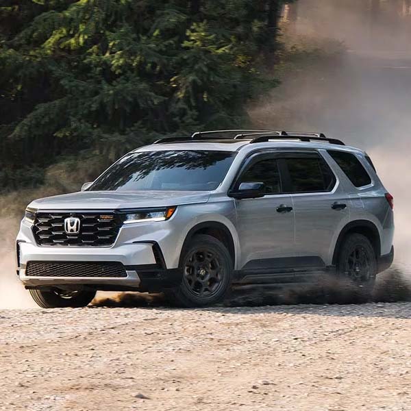 2025 Honda Pilot drifitng kicking up dust