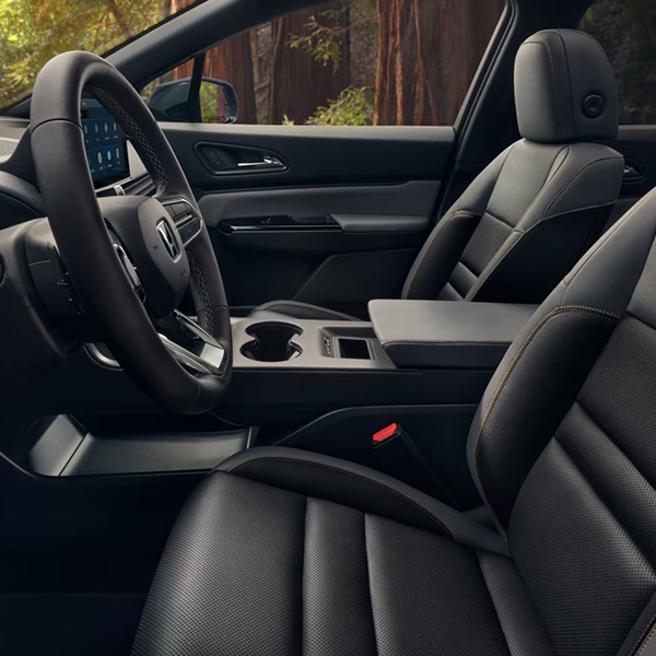 Interior shot of a parked 2025 Honda Prologue Elite shown with Black Leather.