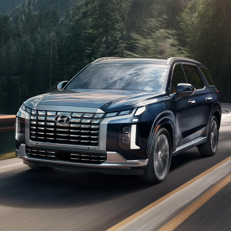 2025 Hyundai Palisade front 3/4 view - driving.