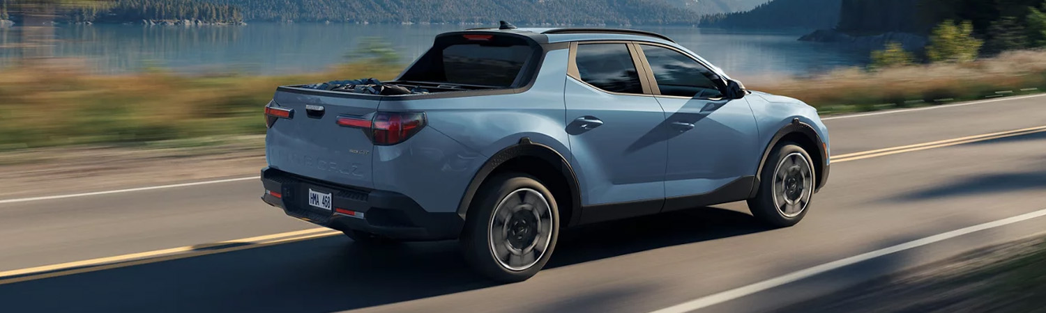 2025 Santa Cruz on two-lane highway.