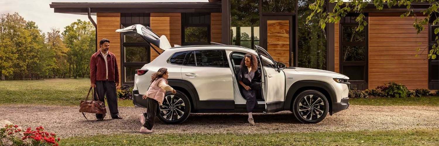 family with new mazda