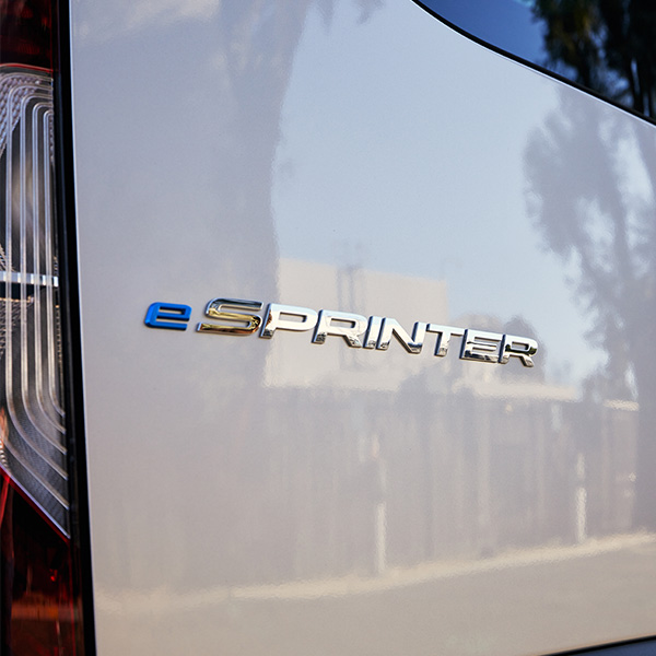 Up close shot of the 2025 Mercedes-Bezn eSprinter Van badge