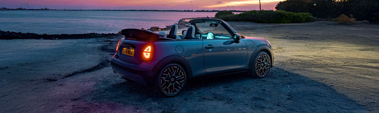 2025 MINI Convertible 3/4 rear shot on a beach at night