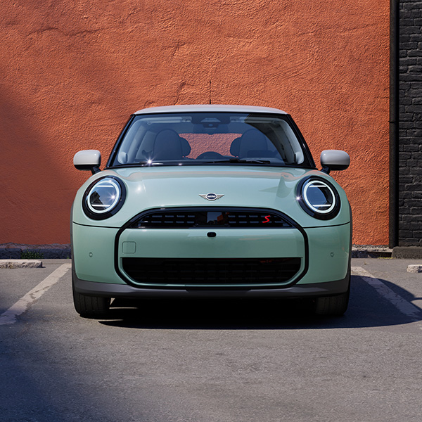 Head on shot of the 2025 MINI Cooper Hardtop 2 Door parked in parking lot.
