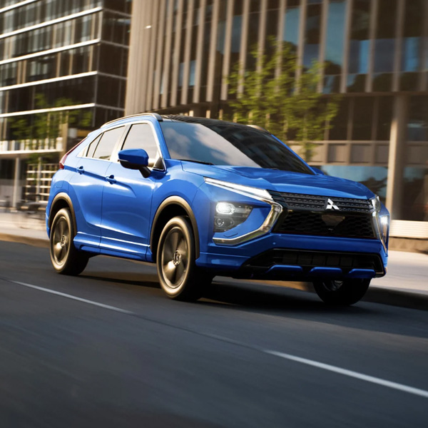Angled front view of a blue 2024 / 2025 Mitsubishi Eclipse Cross Compact SUV