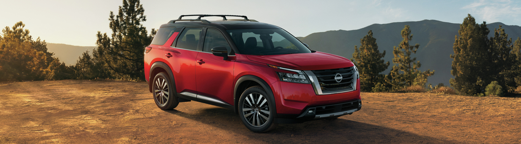 2025 Nissan Pathfinder on a mountain summit.