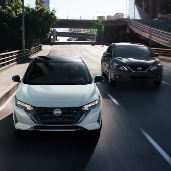 Front view of the 2025 Nissan Sentra driving on the highway