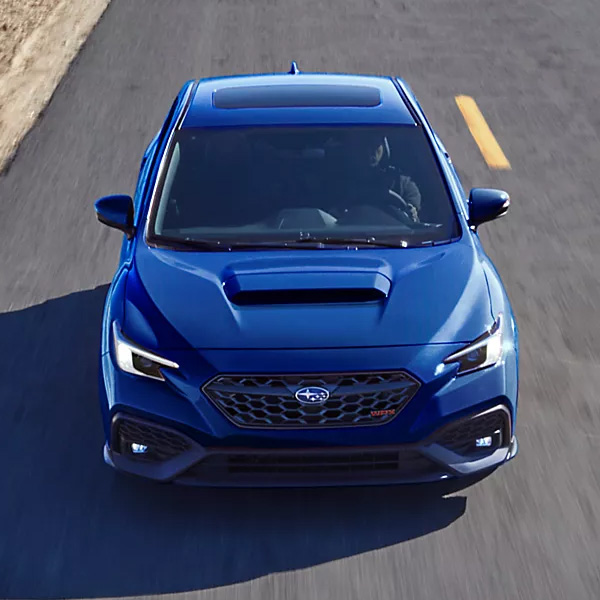 Above shot of a 2025 Subaru WRX driving on a road.