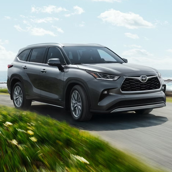 Hybrid Limited 25th Edition shown in Heavy Metal driving on a coastal road