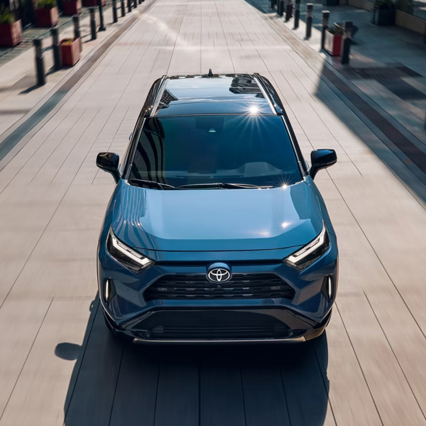 Hybrid XSE shown in Cavalry Blue with Midnight Black Metallic roof with Advanced Technology Package and panoramic glass roof.