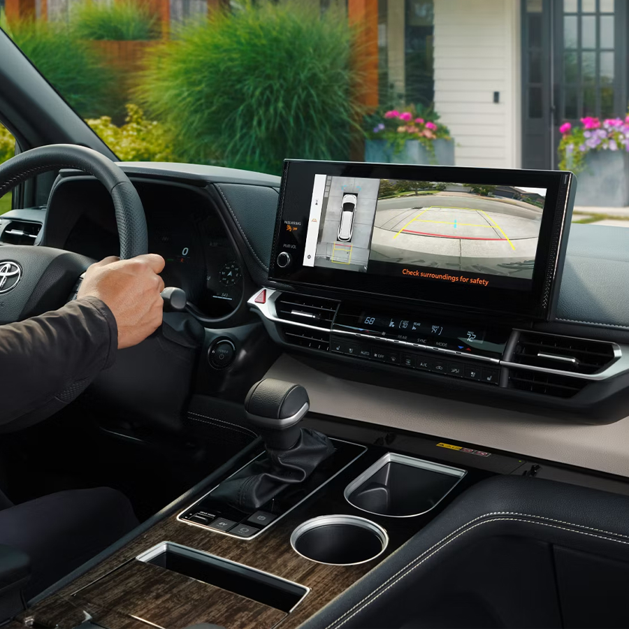 2025 Toyota Sienna Platinum interior shown in Macadamia leather trim.
