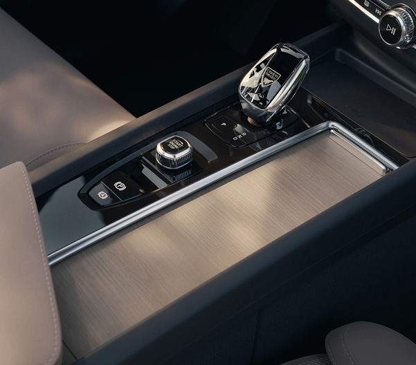 The side profile of a gray Volvo XC60 SUV.