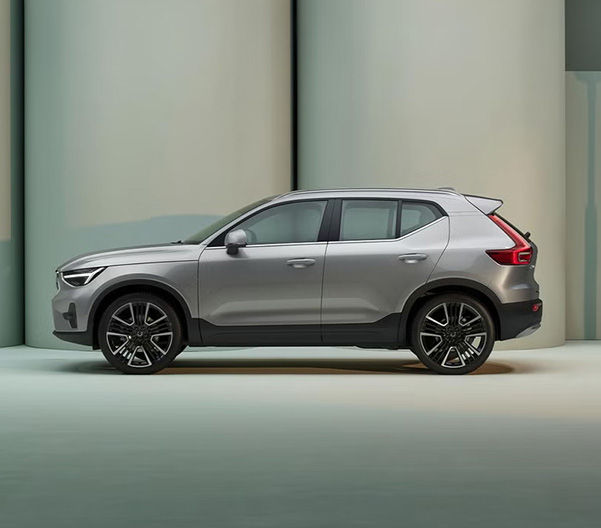The side profile of a silver Volvo XC40 SUV.