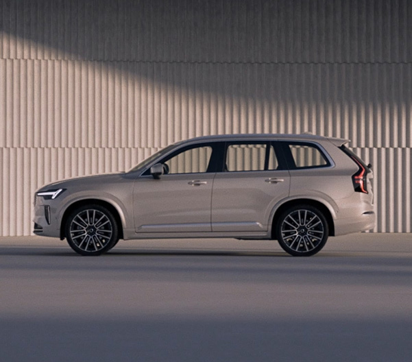 The side profile of a Volvo XC90 SUV.