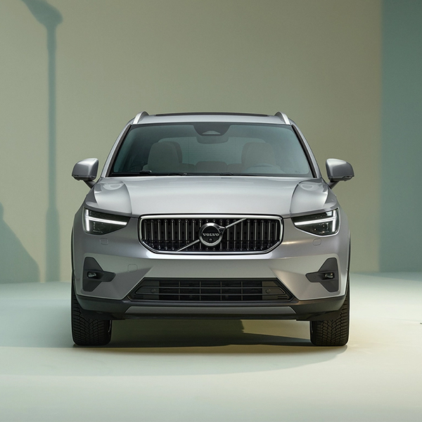 2025 Volvo XC40 parked in a green studio.