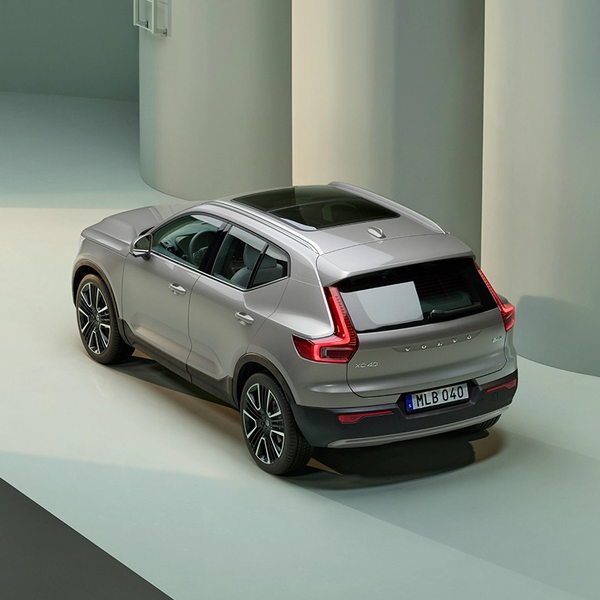 The side profile of a silver Volvo XC40 SUV.