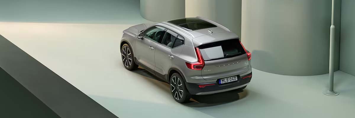 The side profile of a silver Volvo XC40 SUV.