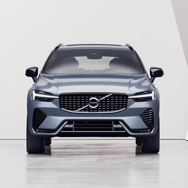 2025 Volvo XC60 parked in a white studio.