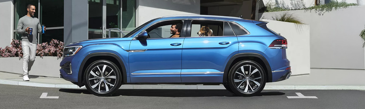 Side profile shot of the 2025 Volkswagen Atlas Cross Sport on street