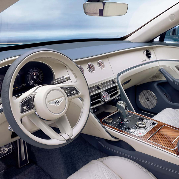 Interior dashboard and steering wheel of 2026 Bentley Flying Spur Azure