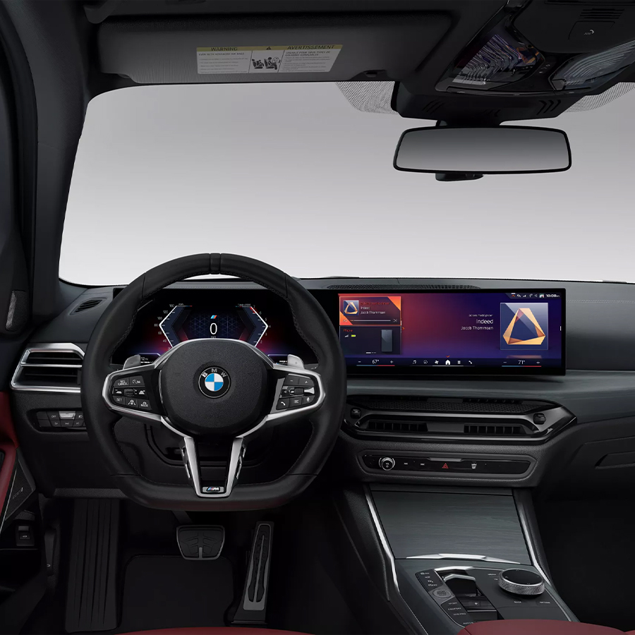 The front interior of the BMW 330i Sedan
