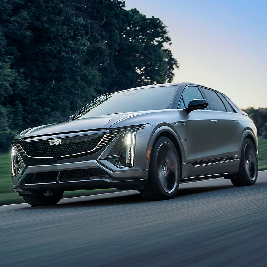 Shot of the 2026 Cadillac Lyriq driving down road