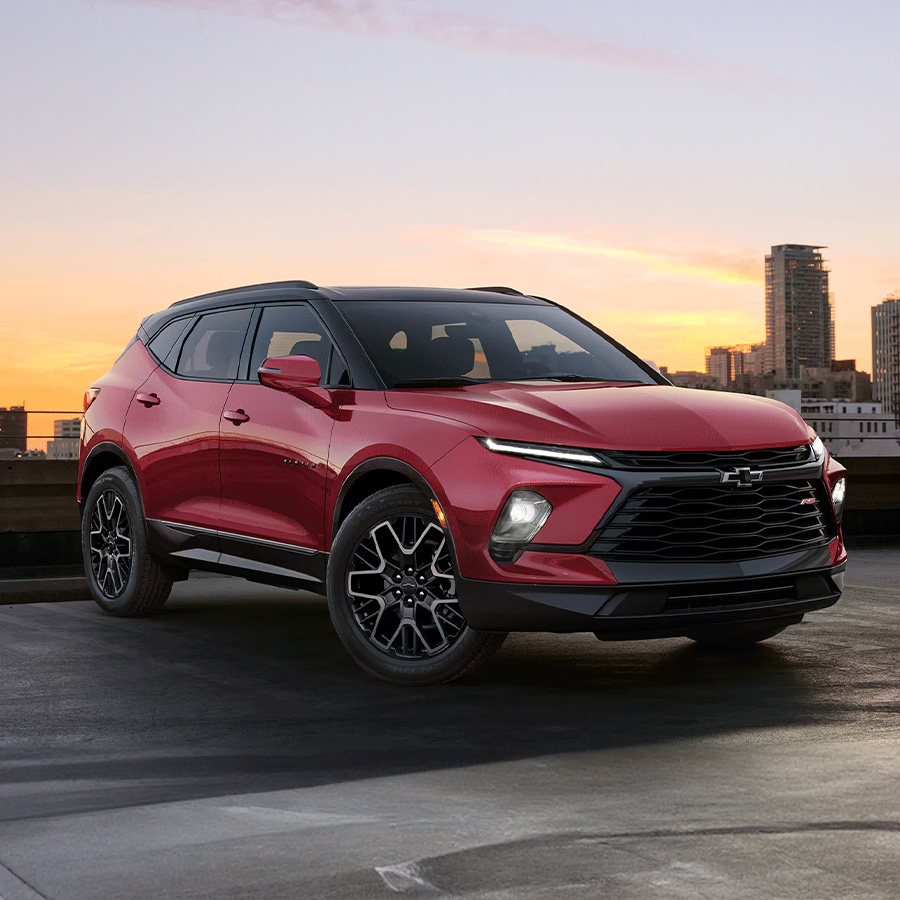 2026 Chevy Blazer parked on a rooftop with the city in the background