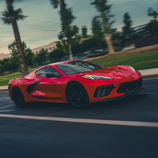2026 Chevy Corvette Stingray Speeding Around a Bend in the Road