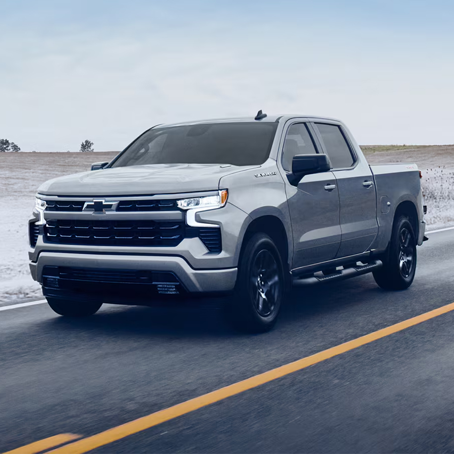2026 Chevrolet Silverado driving on road.