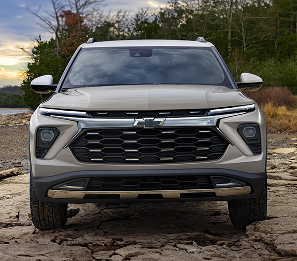 2026 Chevy Trailblazer Head On With Lake and Woods in Background.
