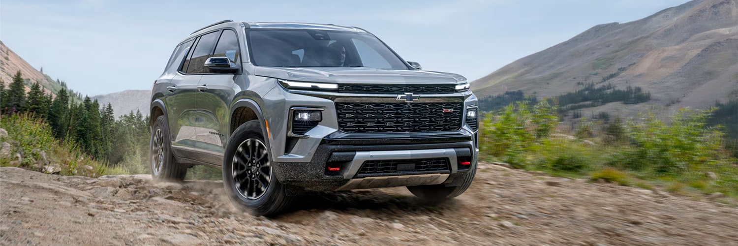 2026 Chevy Traverse Parked on a Dirt Trail in the Mountains