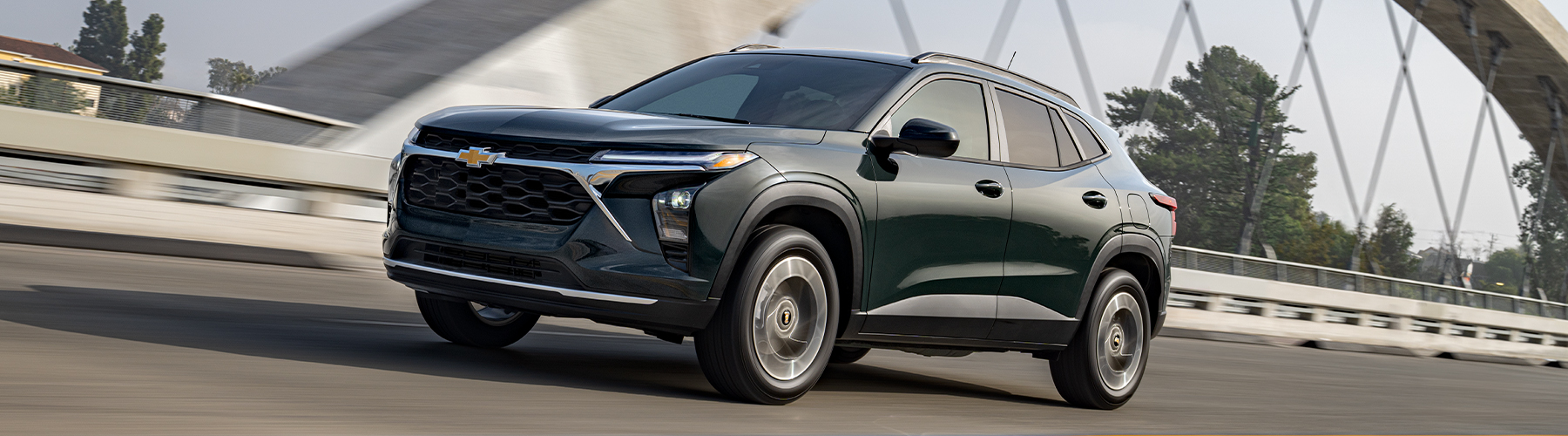 2026 Chevy Trax Driving Through a Downtown Road