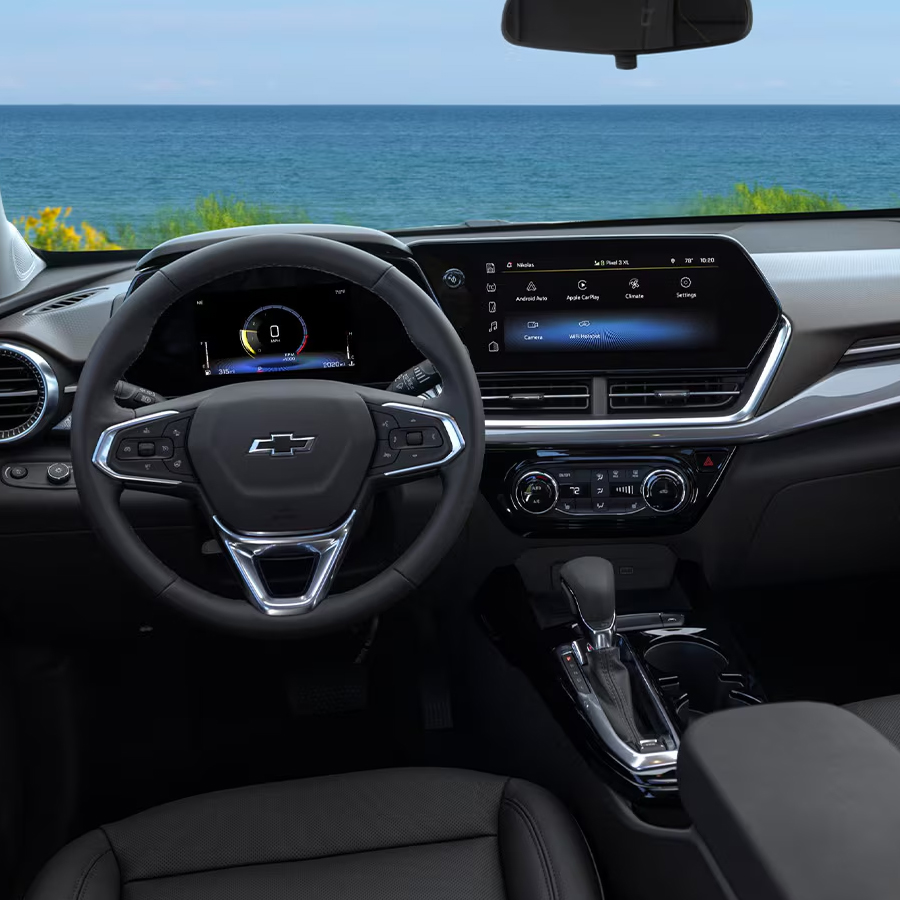 2026 Chevy Trax Interior Dashboard And View of a Lake Through the Windshield
