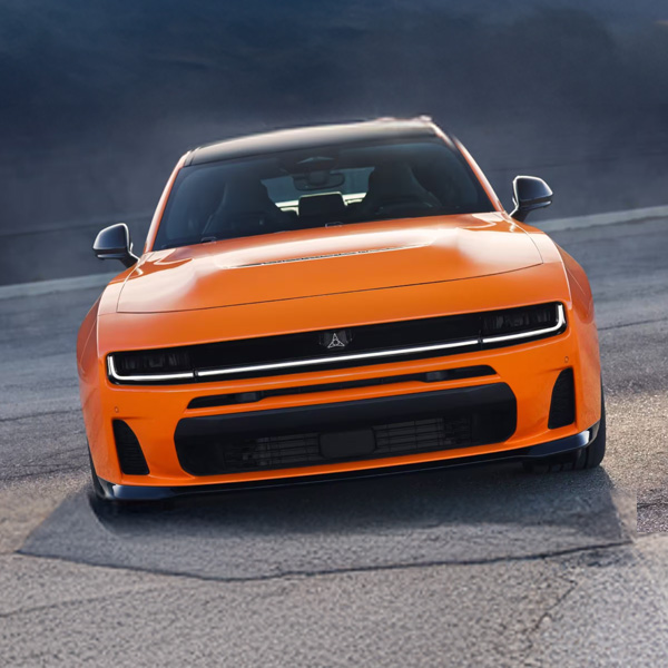 Front view of orange 2026 Dodge Charger