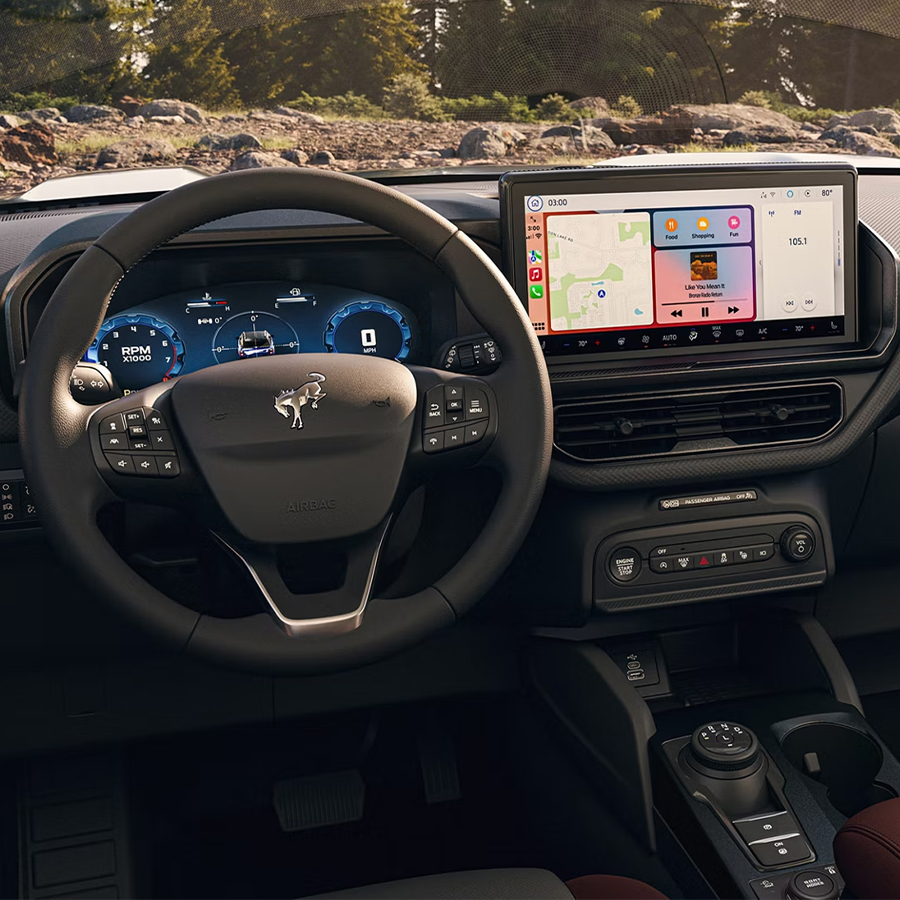2026 Ford Bronco Sport® interior highlighting the steering wheel and center console screen
