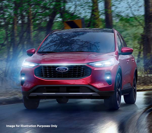 Red 2026 Ford Escape racing down a road
