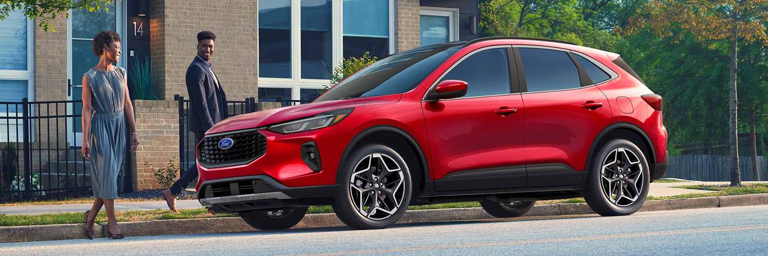 Side profile shot of the 2026 Ford Escape parked on side of street