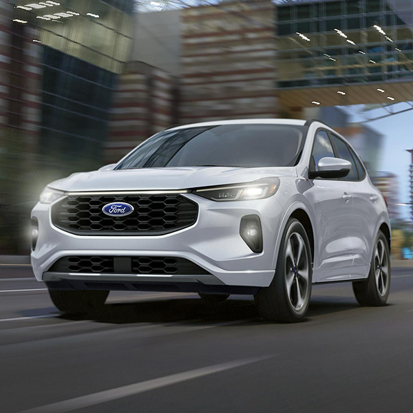 2026 Ford Escape® SUV being driven on a city street
