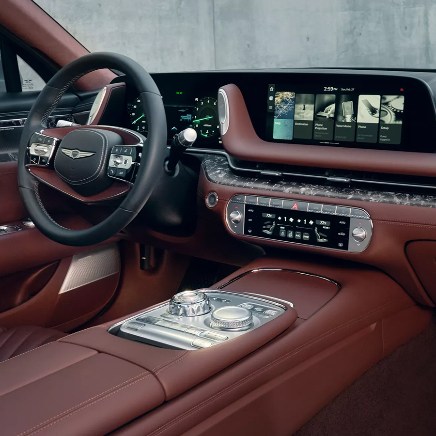 Front passenger seat POV front seats in 2026 Genesis G90 Obsidian Black and Bordeaux Brown interior
