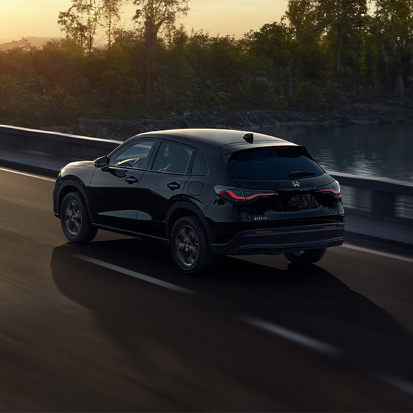 The back of a 2026 Honda HR-V driving on a road