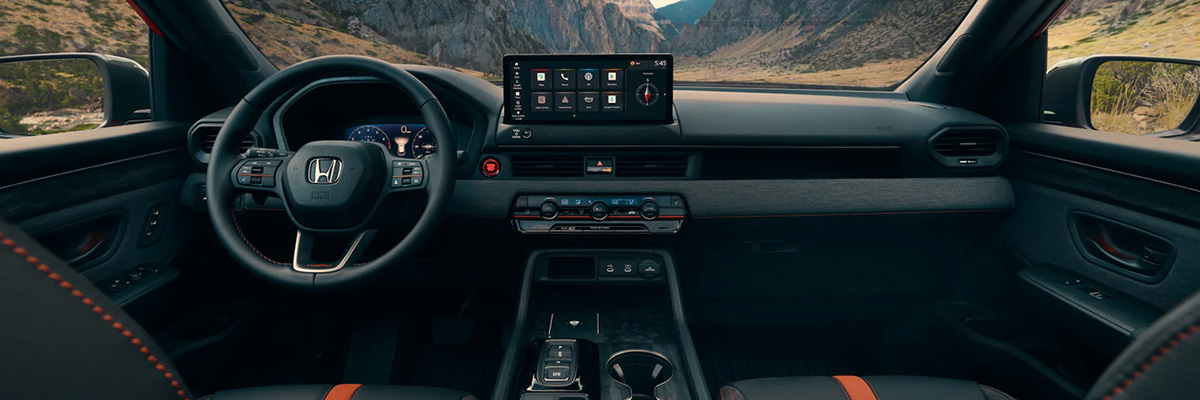 Interior view of the 2026 Honda Passport showing the dashboard and infotainment screen.