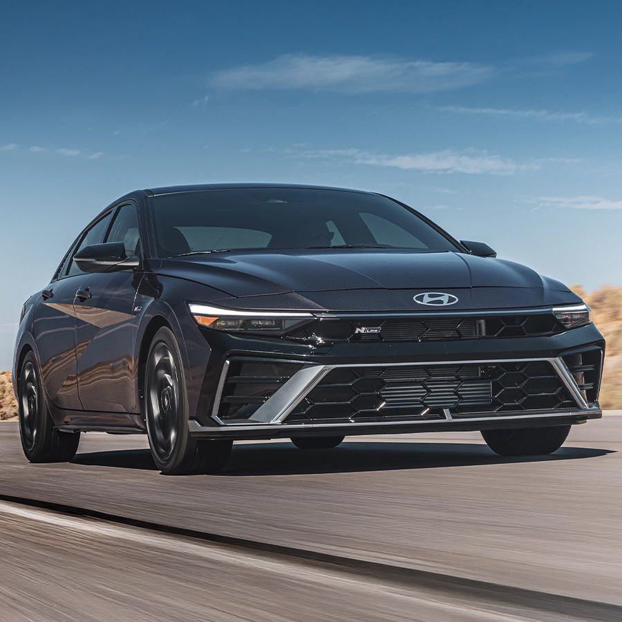 2026 Elantra side 3/4 driving shot.