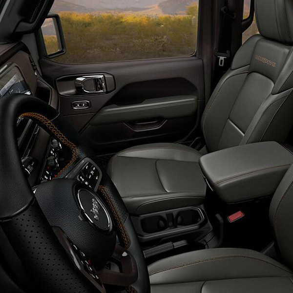 The front seats in a 2026 Jeep Gladiator Mojave.