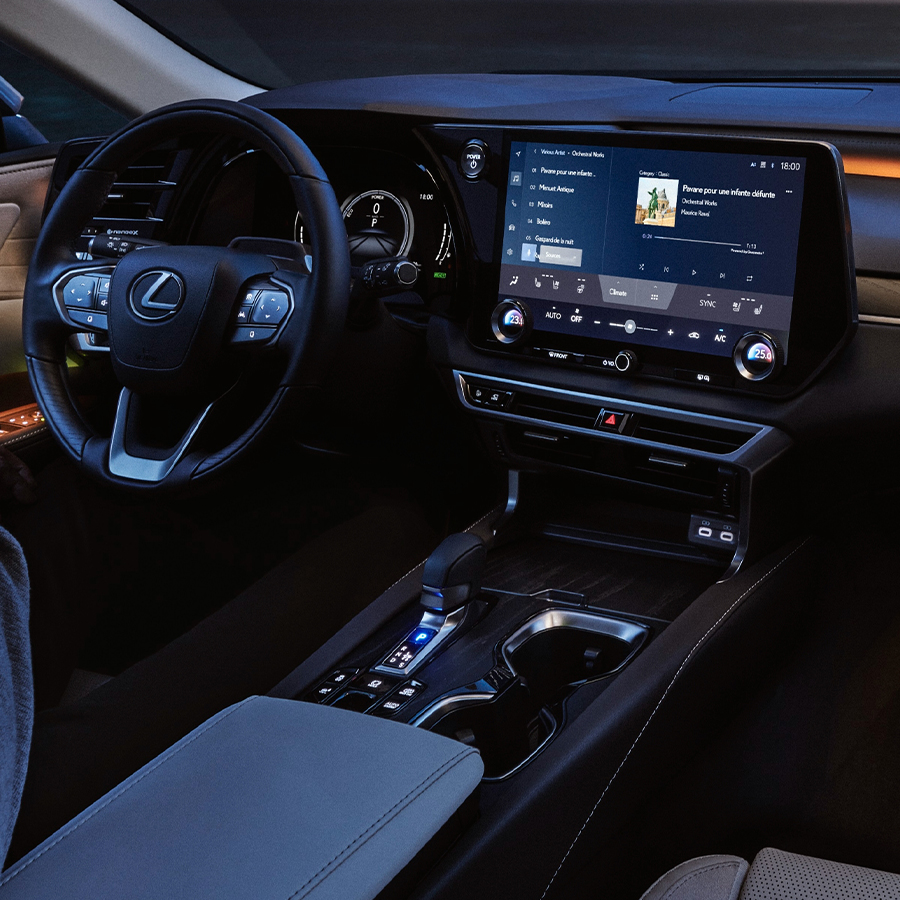 2026 Lexus RX interior featuring digital instrument cluster, touchscreen display, and premium center console