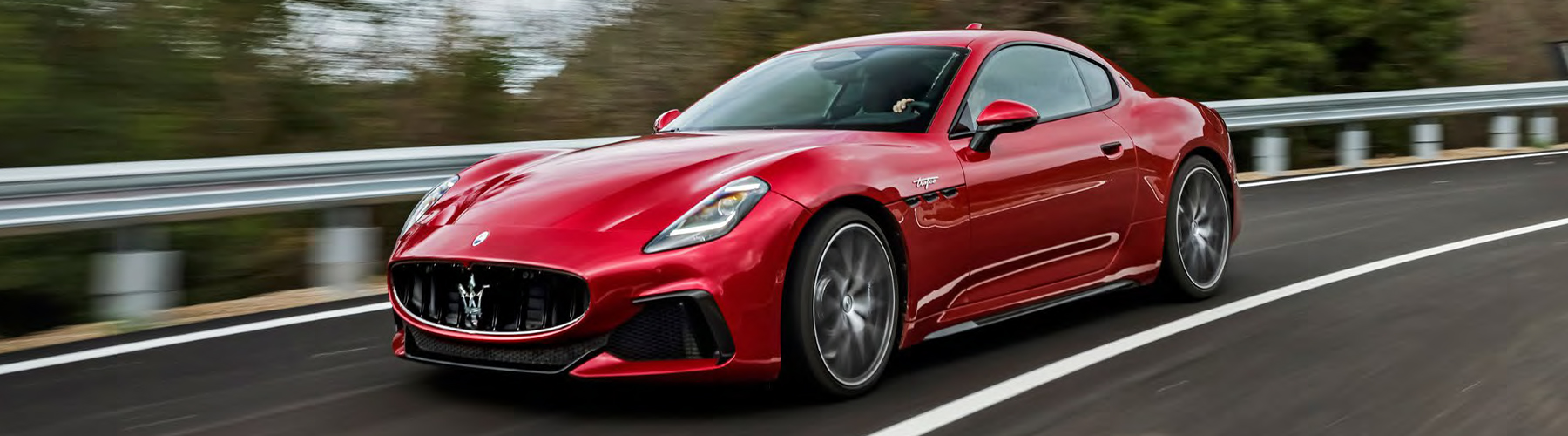 2026 Maserati GranTurismo driving on highway road