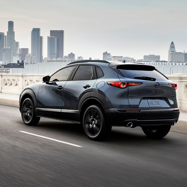 2026 Mazda CX-30 driving through a city